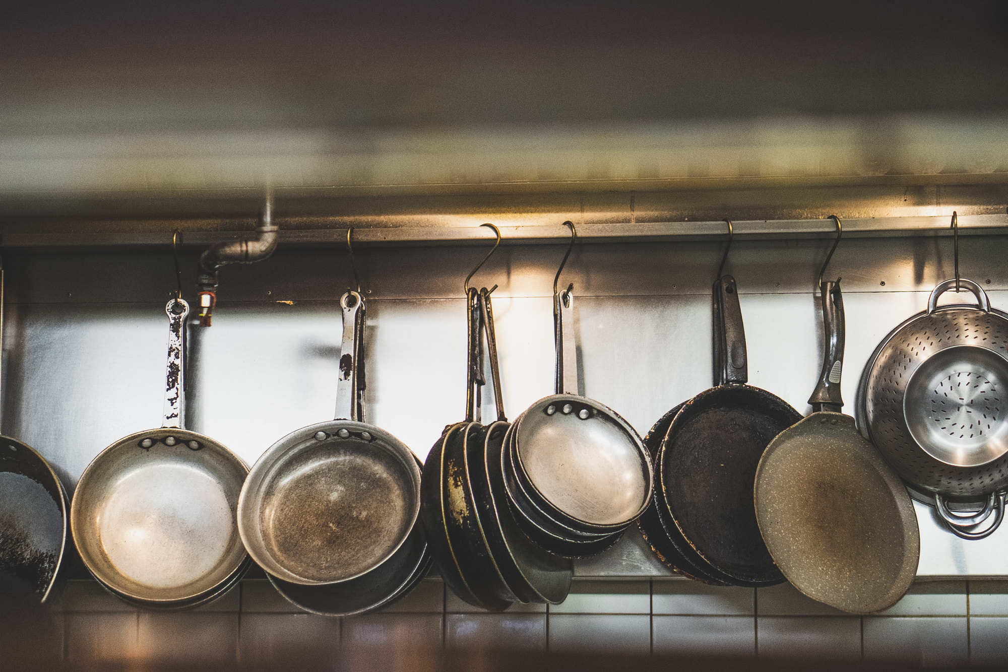 Pots and pans hanging in the Darlise Cafe kitchen
